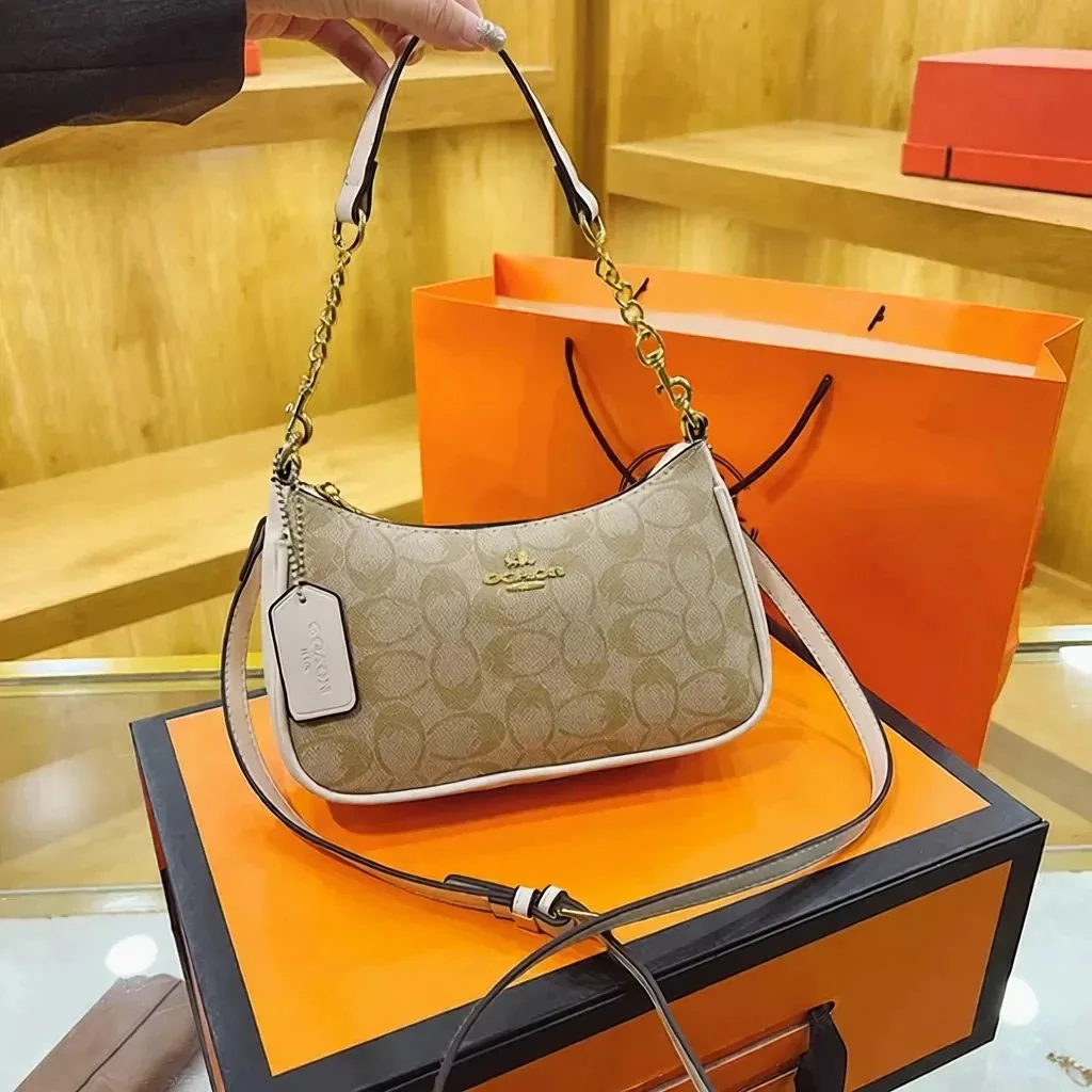 Coach classic monogram crescent-shaped underarm bag