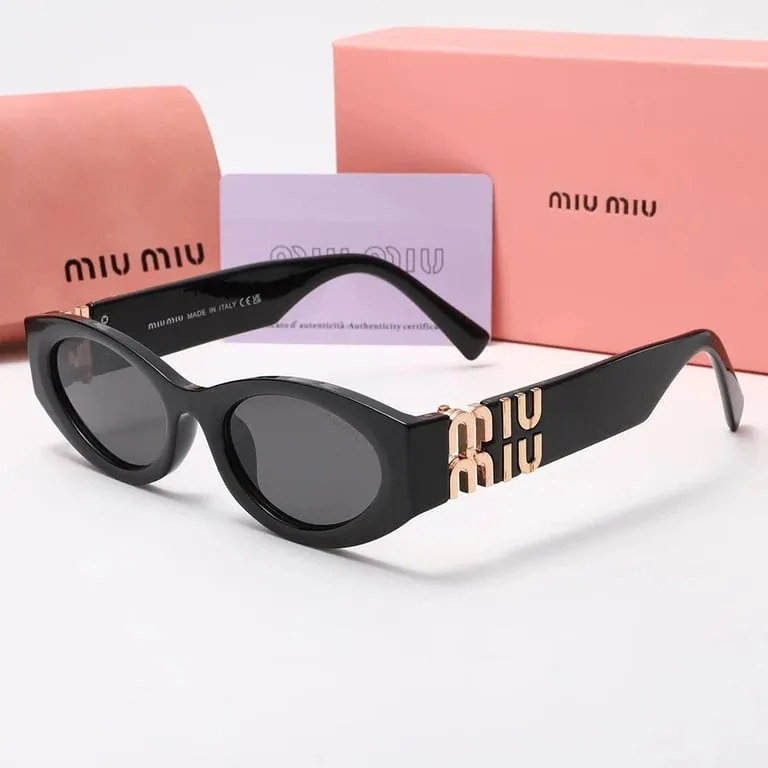 Miu Miu Oval Sunglasses
