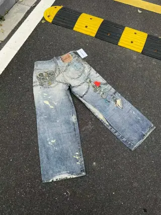 Acne Studios 3D-Printed Chain Graffiti Wide-Leg Jeans