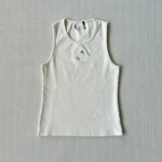 Off-White Ribbed Tank Top with a Distressed Worn-In Look